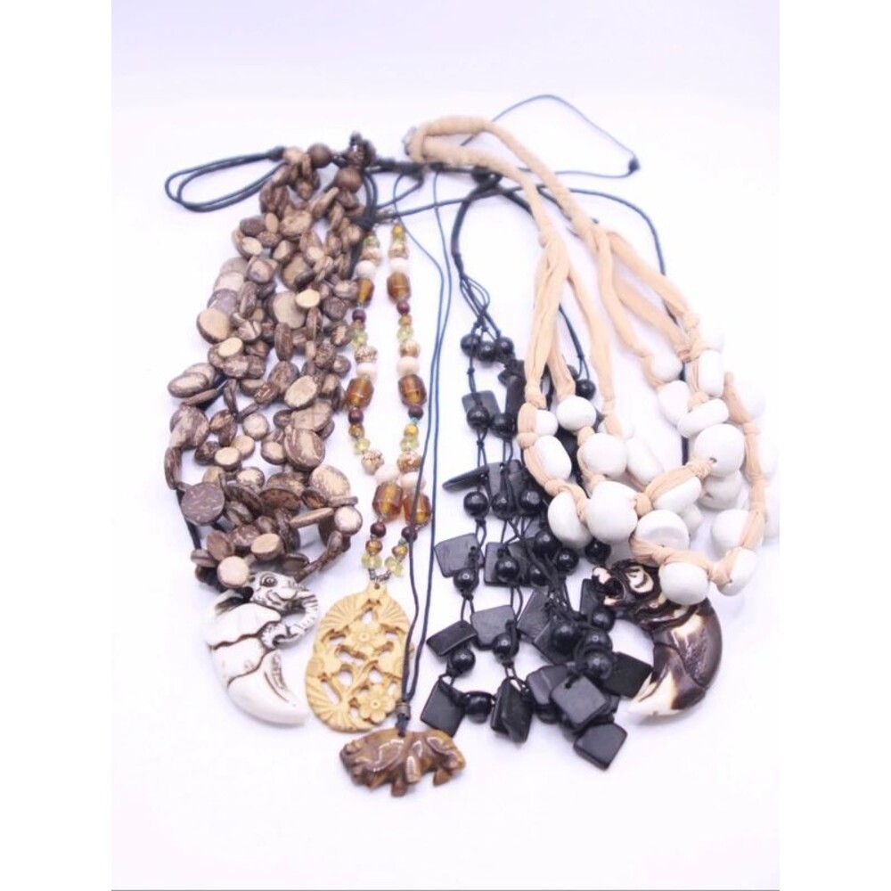 Lot of wood and carved accent necklaces